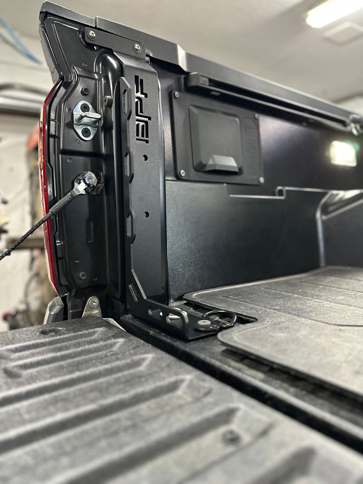 Close-up of a black BPF 2024-2025 Toyota Tacoma Bed Stiffeners installed in the truck bed corner, showing durable construction and OEM fitment.