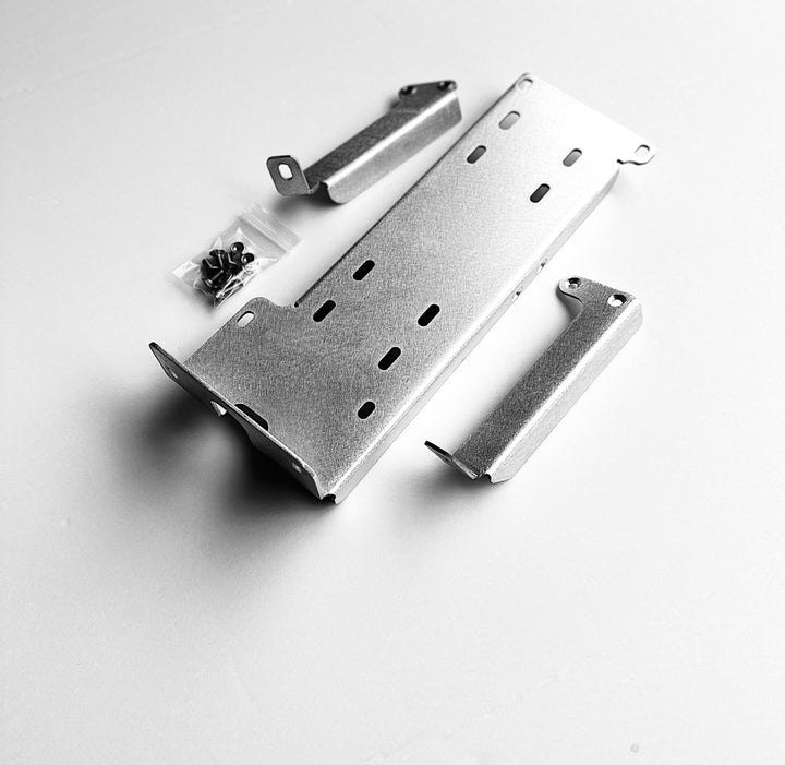 BPF 2016-2023 3rd Gen Tacoma Compressor mount made of powder-coated metal with mounting brackets and hardware, designed for durable OEM fitment in Tacoma trucks.