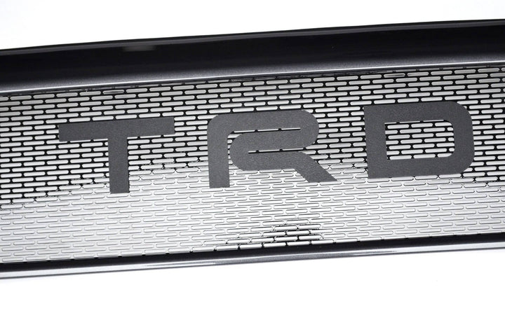 BPF Completed 2012-2015 Toyota Tacoma Grill featuring a durable powder-coated mesh design with bold TRD lettering, offering a CNC fabricated, OEM fitment upgrade for Tacoma trucks.