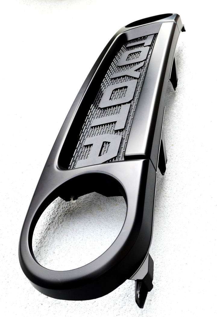 Close-up of a black automotive grille mesh and lettering detail designed for BPF 2007-2014 Toyota FJ Mesh and Lettering, featuring bold, textured design and smooth finishes.