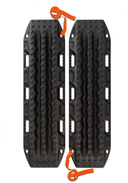 Pair of black MAXTRAX MKII recovery boards with raised traction cleats and orange quick-release straps, designed for vehicle off-road tire traction.