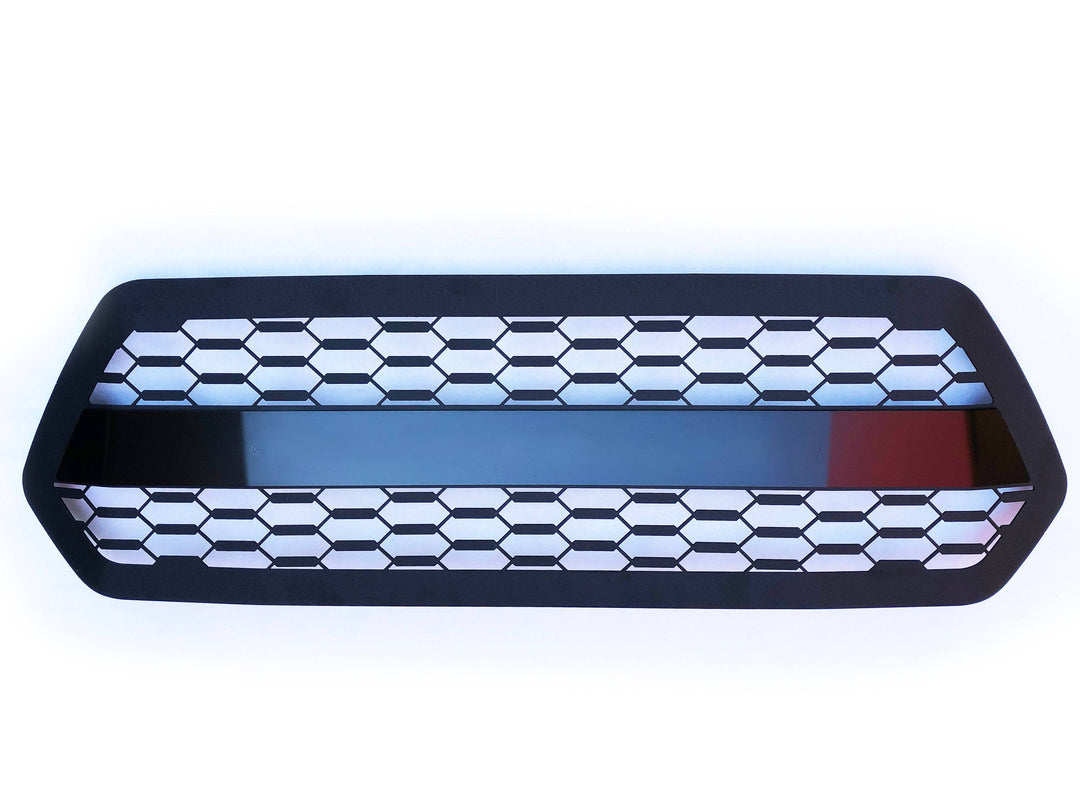BPF 2016-2023 Toyota Tacoma Grill featuring a black powder-coated honeycomb mesh design, CNC fabricated for durable and precise OEM fitment.